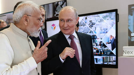 Indian Prime Minister Narendra Modi and Russian President Vladimir Putin talk to each other at the industrial exhibit Innoprom of India, on the sidelines of the BRICS Summit, New Delhi, India, September 11, 2026.
