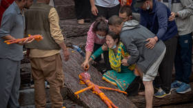 Nepal rescuers delayed by mud and water in tunnels – PM