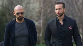 Andrew Tate (L) and his brother Tristan Tate (R) leave the Bucharest Court in Romania, March 7, 2024.