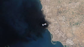 A large smoke plume rising from fires at Saudi Aramco’s Jazan (Jizan) Bulk Plant storage tanks after Houthi drone and missile strikes.