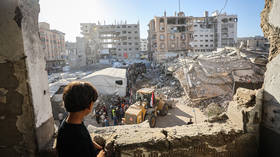 Rescue workers remove bodies from the rubble after a damaged building collapsed in Gaza City, Palestine, September 16, 2026