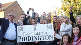 English village votes to leave UK over migrant plan 
