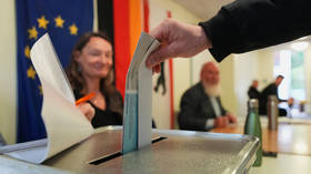 A man casts his ballot in the Berlin state election in Berlin, Germany, September 20, 2026.