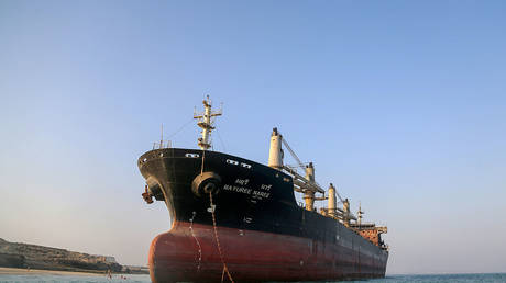 Tanker with 21 Indian sailors struck in Strait of Hormuz