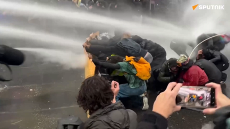 Mass protests grip Europe with tear gas, fireworks and water cannon (VIDEOS)