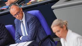 German Chancellor Friedrich Merz watches as AfD co-chair Alice Weidel delivers a speech at the Bundestag in Berlin, Germany, on September 9, 2026.