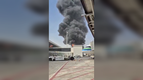 Smoke rises from King Khalid International Airport after an apparent Houthi missile strike in Riyadh, Saudi Arabia, October 6, 2026