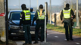 Lithuanian police officers are seen near the Vilnius airport on November 25,2024.