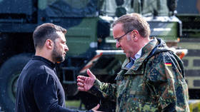 Ukraine's Vladimir Zelensky (L) meets German Defense Minister Boris Pistorius (R) in Mecklenburg-Western Pomerania, Germany, on June 11, 2024.