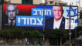 Posters of Yashar Party leader Gadi Eisenkot (R) and Prime Minister Benjamin Netanyahu seen in Tel Aviv, Israel, October 25, 2026