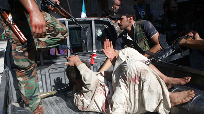 War crime? Syrian rebels execute POWs