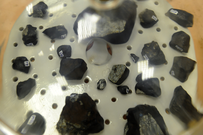 Fragments of the meteorite are studied at the laboratory of the Research and Educational Center of Nanomaterials and Nanotechnologies of Ural Federal University. (RIA Novosti / Pavel Lysizin)