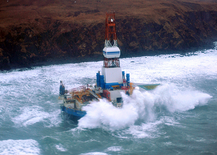 The conical mobile drilling unit Kulluk owned by Royal Dutch Shell agroundaground on the southeast side of Sitkalidak Island, Alaska, January 1, 2013. (AFP Photo / US Coast Guard / Petty Officer)