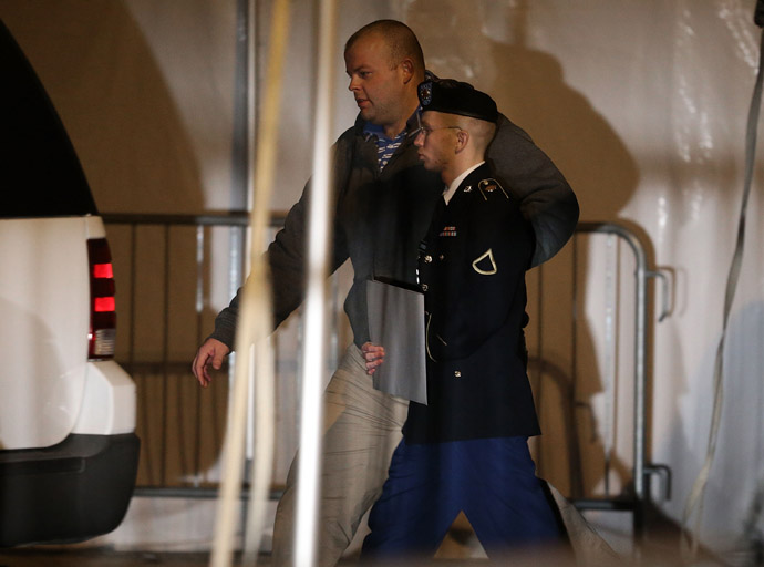 Pfc. Bradley E. Manning is escorted from a hearing, on February 28, 2013 in Fort Meade, Maryland. (Mark Wilson/Getty Images/AFP)