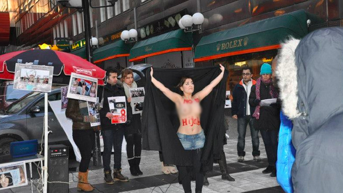 Female Iranian communists organize topless protest against hijabs in Swedish capital (PHOTOS)