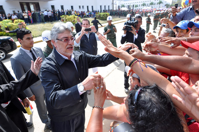 Former Paraguayan President Fernando Lugo arrives to pay his respects to deceased Venezuelan President Hugo Chavez, in Caracas, on March 8, 2013. (AFP Photo/Luis Camacho)