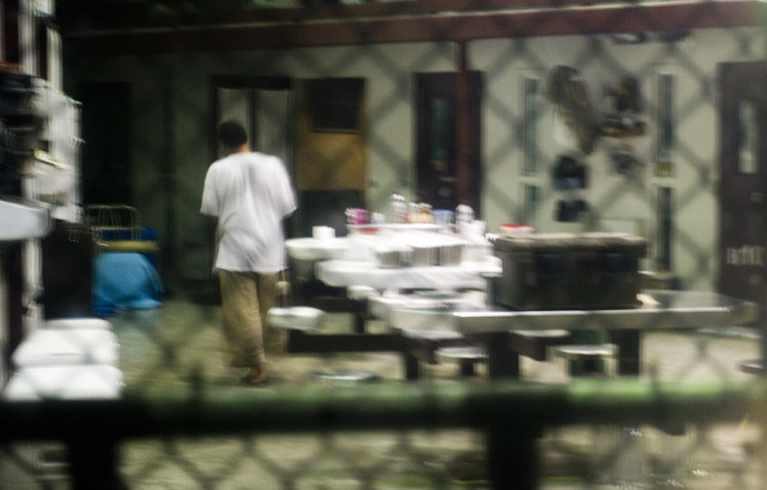 This image reviewed by the US military shot through a one way mirror shows a detainee in Cell Block B of the "Camp Six" detention facility of the Joint Detention Group at the US Naval Station in Guantanamo Bay, Cuba, January 19, 2012. (AFP Photo/Jim Watson)