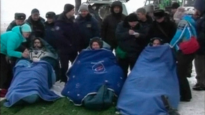 Soyuz spacecraft lands successfully, crew safe (PHOTOS)