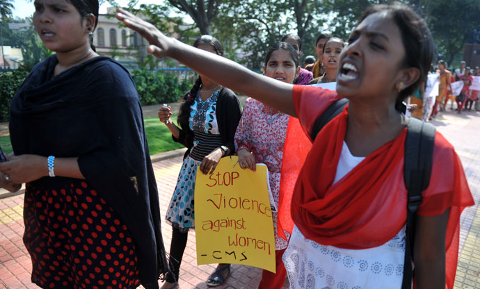 Indian students of various organisations hold placards as they shout slogans during a demonstration in Hyderabad on January 3, 2013.(AFP Photo / Noah Seelam)