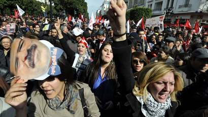 Thousands take to the streets after opposition leader gunned down in Tunisia