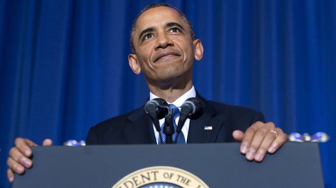 US President Barack Obama listens as a protester shouts during a speech about his administration's drone and counterterrorism policies, as well as the military prison at Guantanamo Bay, at the National Defense University in Washington, DC, May 23, 2013. (AFP Photo / Saul Loeb)