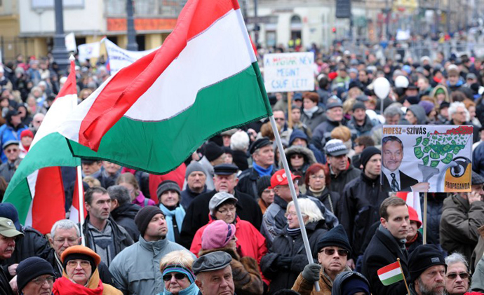 Thousands of people protested against the Hungarian right-wing government and its economy, financial and interior policy. (AFP Photo / Attila Kisbenedek)