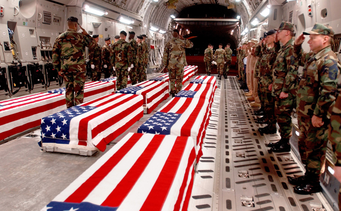Coffins of U.S. military personnel are prepared to be offloaded at Dover Air Force Base in Dover, Delaware in this undated photo (Reuters / USAF / www.thememoryhole.org)