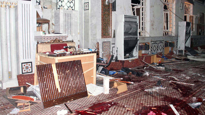 An image made available by the Syrian Arab News Agency (SANA) on March 21, 2013 shows carpeted floor covered with blood inside of the Iman Mosque in the Mazraa neighbourhood of the Syrian capital Damas, after a suicide attack on March 21, 2013 (AFP Photo / SANA)