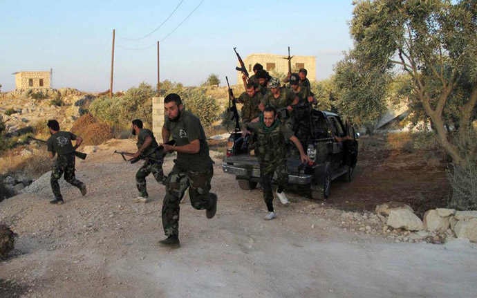 Free Syrian Army fighters from Katibat al-Farouk training on the outskirts of Idlib (AFP Photo/Shaam News Network)