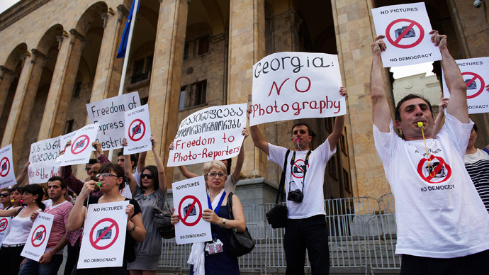 Georgia lifts photographers’ Saakashvili-era espionage sentence