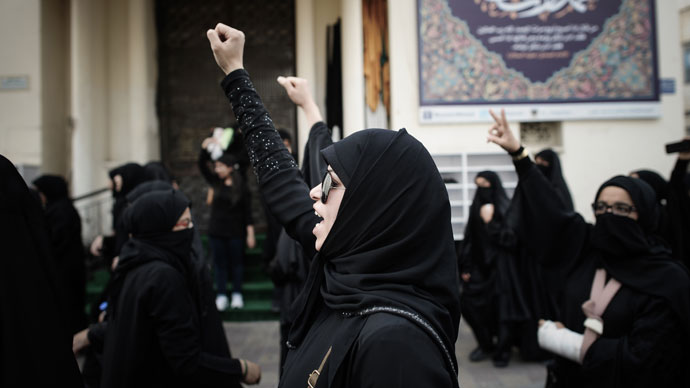 Bahraini women shout slogans as they march during an anti-regime rally in solidarity with jailed human rights activist Nabeel Rajab and against the upcoming Bahrain Formula One Grand Prix in Manama on March 29, 2013.(AFP Photo / Mohammed AL-Shaikh)