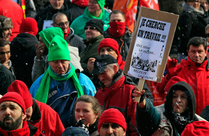 Workers and trade union representatives from all over Europe hold a demonstration against austerity near the European Commission and Council headquarters in Brussels March 14, 2013.(Reuters / Yves Herman)