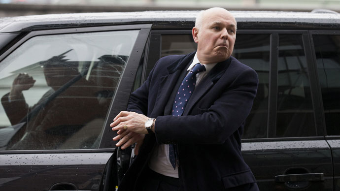British Secretary of State for Work and Pensions Iain Duncan Smith exits a vehicle in London.(AFP Photo / Justin Tallis)