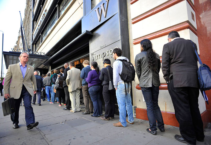 A queue into one on the stores of the UK's Waterstones book retail chain. (Reuters / Toby Melville)