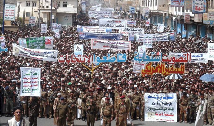 n this handout picture distributed by the press office of Yemen's Zaidi rebels, also known as Huthis, residents of the northern Yemeni province of Saada, where only one polling station was open, protest against participation in the presidential elections on February 21, 2012. (AFP Photo)