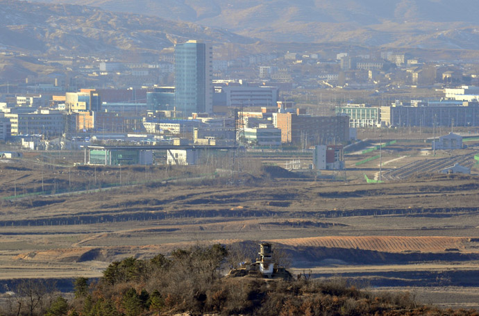 A North Korean guard post (bottom) and the inter-Korean industrial complex of Kaesong (background) is seen from a South Korean observation tower in Paju near the Demilitarized Zone (DMZ) dividing the two Koreas (AFP Photo/Jung Yeon-Je)
