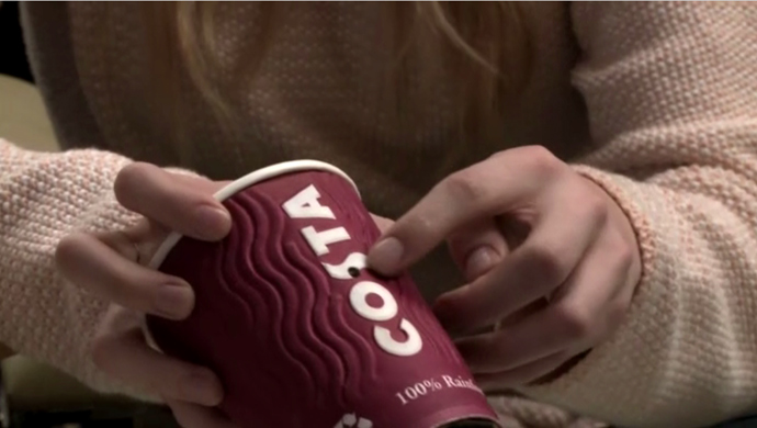 Olivia shows RT a minute camera concealed inside a takeaway coffee cup