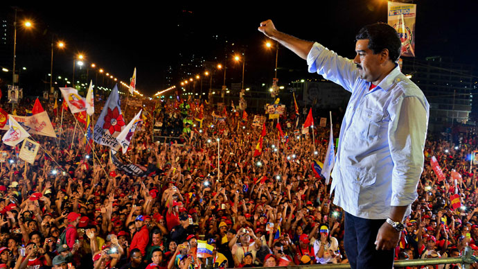 Venezuelan acting President and presidential candidate Nicolas Maduro gestures during his closing campaign rally in Caracas on April 11, 2013 .(AFP Photo / Luis Acosta)