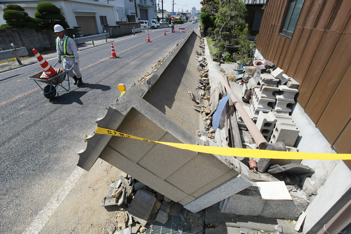A concrete wall has collapsed at Awaji city in Awaji islad, Hyogo prefecture, western Japan on April 13, 2013 after a strong earthquake (AFP Photo / Jiji Press)