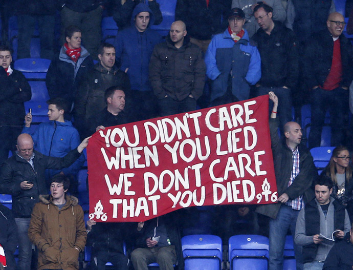 Liverpool fans hold up a banner commenting on the death of former British Prime Minister Margaret Thatcher, before their English Premier League soccer match against Reading at the Madejski Stadium in Reading, April 13, 2013. (Reuters)