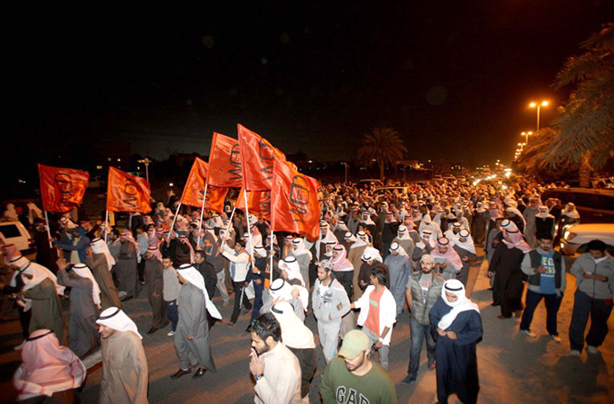 Kuwaiti opposition supporters take part in a protest against a court order to the arrest of three former MPs in Al-Andalus district, north of Kuwait City, on February 6, 2013. (AFP Photo / Yasser Al-Zayyat)
