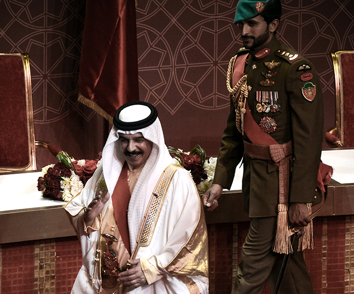Bahrain's King Hamad bin Issa al-Khalifa (left) and his son Sheikh Nasser Bin Hamad Al-Khalif (right). (AFP Photo / Mohammed Al-Shaikh)