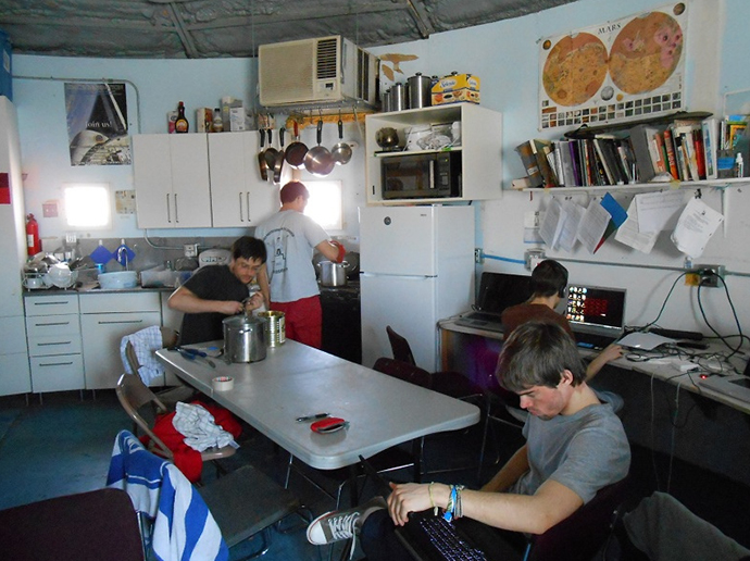 The MDRS crew 127 working inside the station (Image from Flickr user MDRS.Photos)