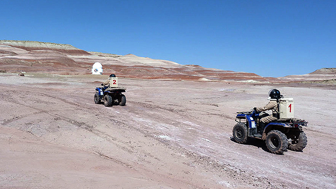 The MDRS crew driving ATVs during a surface mission (Image from Flickr user MDRS.Photos)