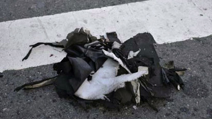 This photograph obtained April 16, 2013 courtesy of the Federal Bureau of Investigation (FBI) shows the remnants of a black backpack that the FBI says contained one of the bombs used in the Boston Marathon on April 15, 2013.(AFP Photo / FBI)