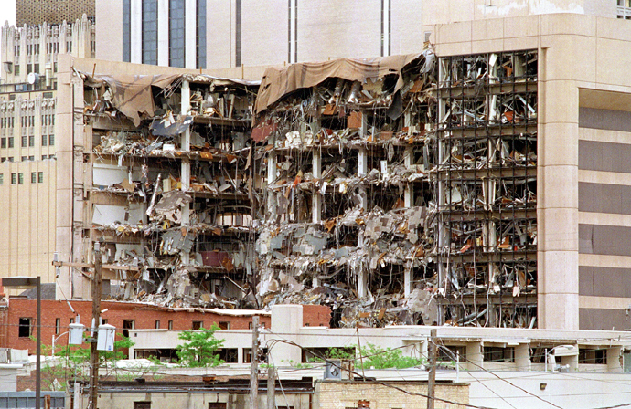 The north side of the Albert P. Murrah Federal Building in Oklahoma City shows 19 April 1995 the devastation caused by a fuel-and fertilizer truck bomb that was detonated early 19 April in front of the building (AFP Photo / Bob Daemmrich) 