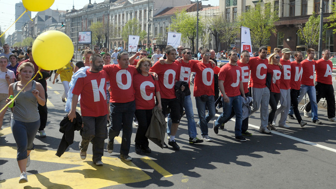 A group of Belgrade marathon runners wear a slogan reading "Kosovo is Serbia" on April 21, 2013. (AFP Photo / Alexa Stankovic)