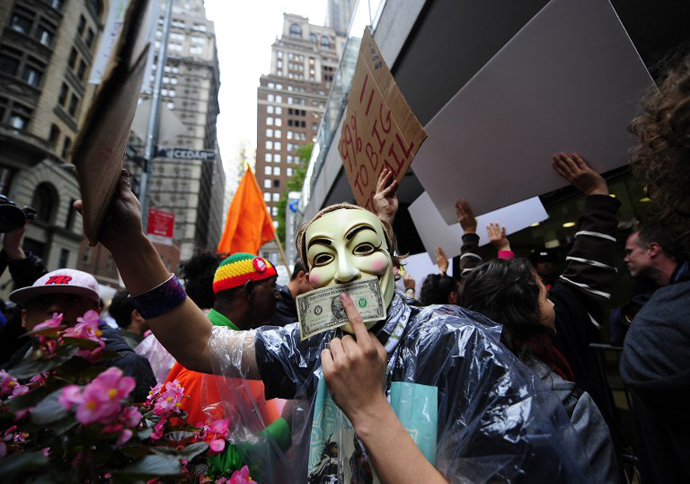 Occupy Wall Street members stage a protest march near Wall Street in New York, on October 12, 2011. (AFP Photo / Emmanuel Dunand)