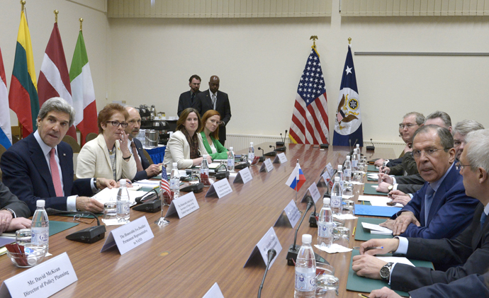 Russian Foreign Minister Sergei Lavrov, right, and the U.S. Secretary of State John Kerry during a meeting of the Russia-NATO Council in Brussels on April 23, 2013. (RIA Novosti / Eduard Pesov)