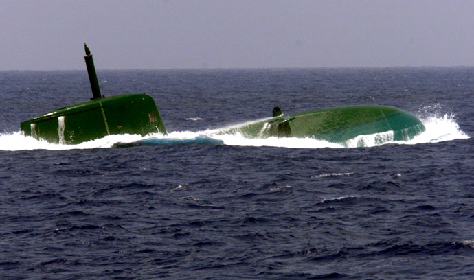 Israel's new Dolphin-class submarine surfaces in the Mediterrannean Sea near Haifa (Reuters)